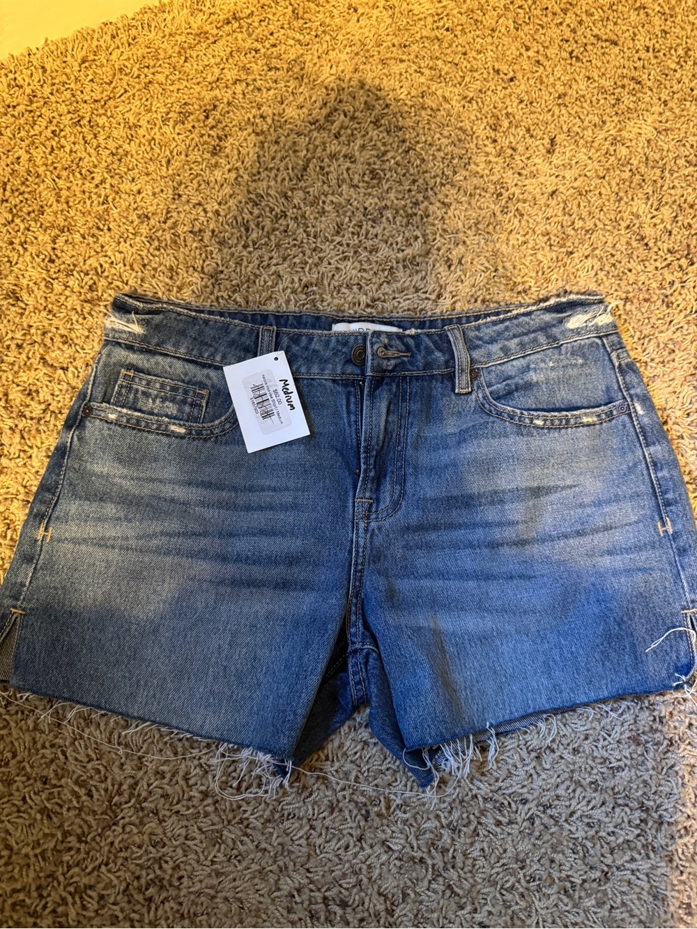 Mid Blue Denim Cutoff Shorts with Frayed Hem